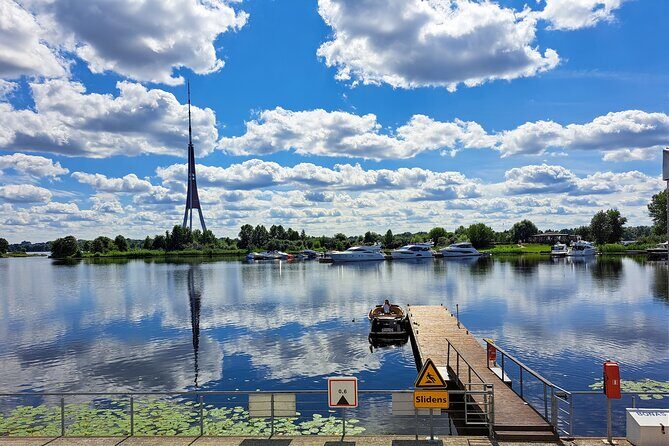Private Boat Tour experience in Riga (City Canal and Daugava) - Crossing the visual line: bridges, the National Library, and St. Peter’s Church