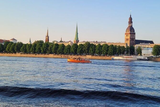 Riga: Evening or Sunset Boat Tour with Drink and Audio Guide - Welcome drink included: a nice start, with one caveat